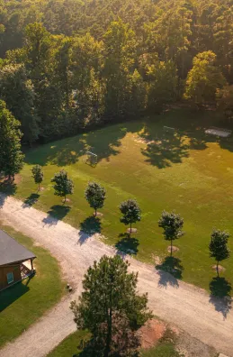 Aerial photo of Camp Kanata campus showing cabin and fields