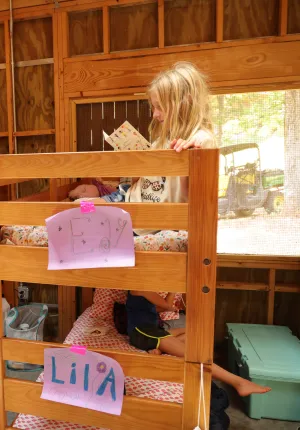 Campers inside cabins at Camp Kanata