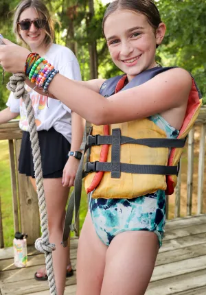 Rope swing at the Camp Kanata lake