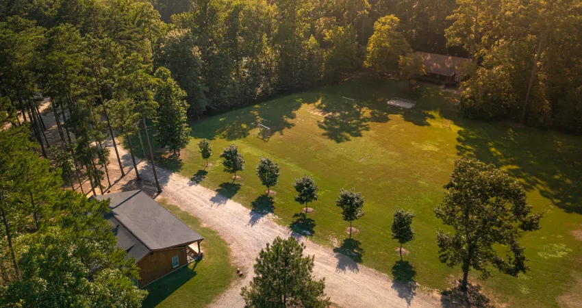 Aerial photo of Camp Kanata campus showing cabin and fields